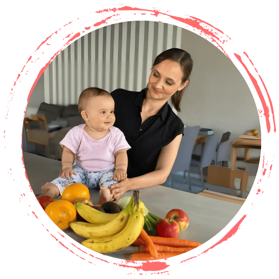 Elvira Davydenko mit Baby und Obstkorb – Online-Programm Innere Stärke von Complete Life